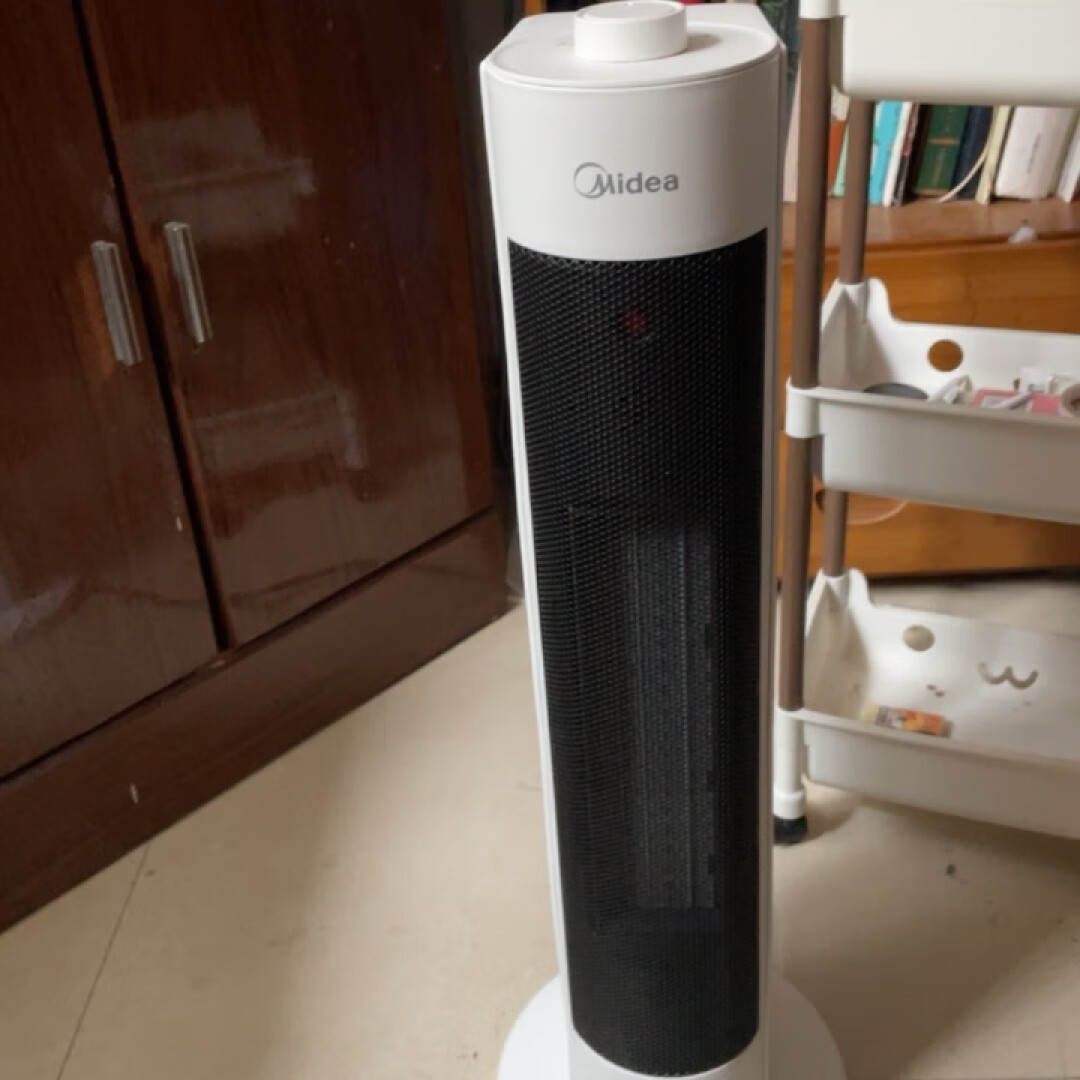 美的(Midea)取暖器/暖风机/电暖气家用/干衣机/热风机速热广角摇头节能电暖器/电暖风HFV20D晒单图