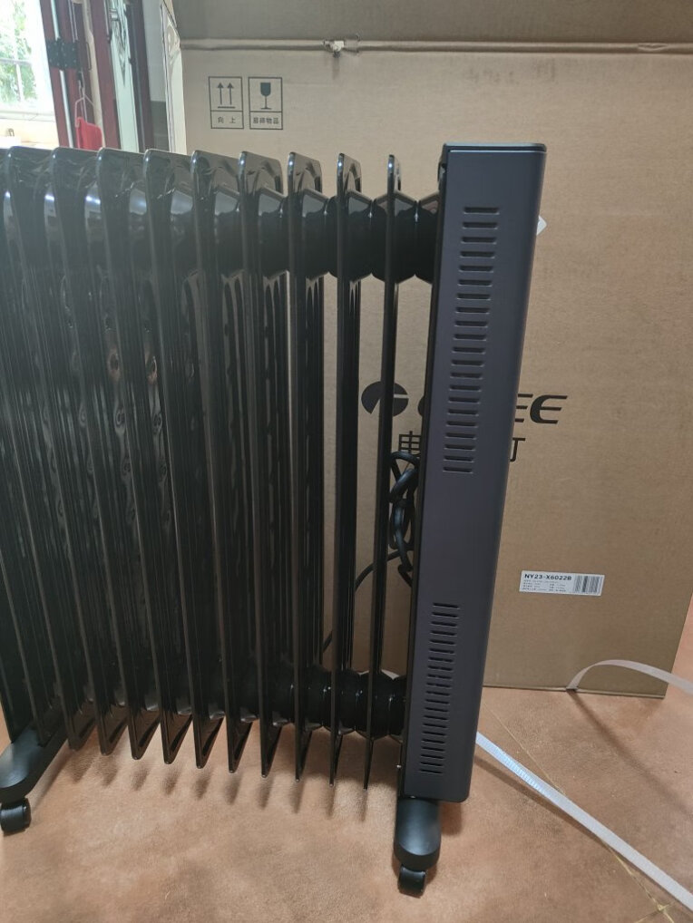 格力(GREE)电油汀取暖家电暖气片加宽13片油汀电热油汀加热石墨烯取暖器家用电暖器 NY23-X6022B晒单图