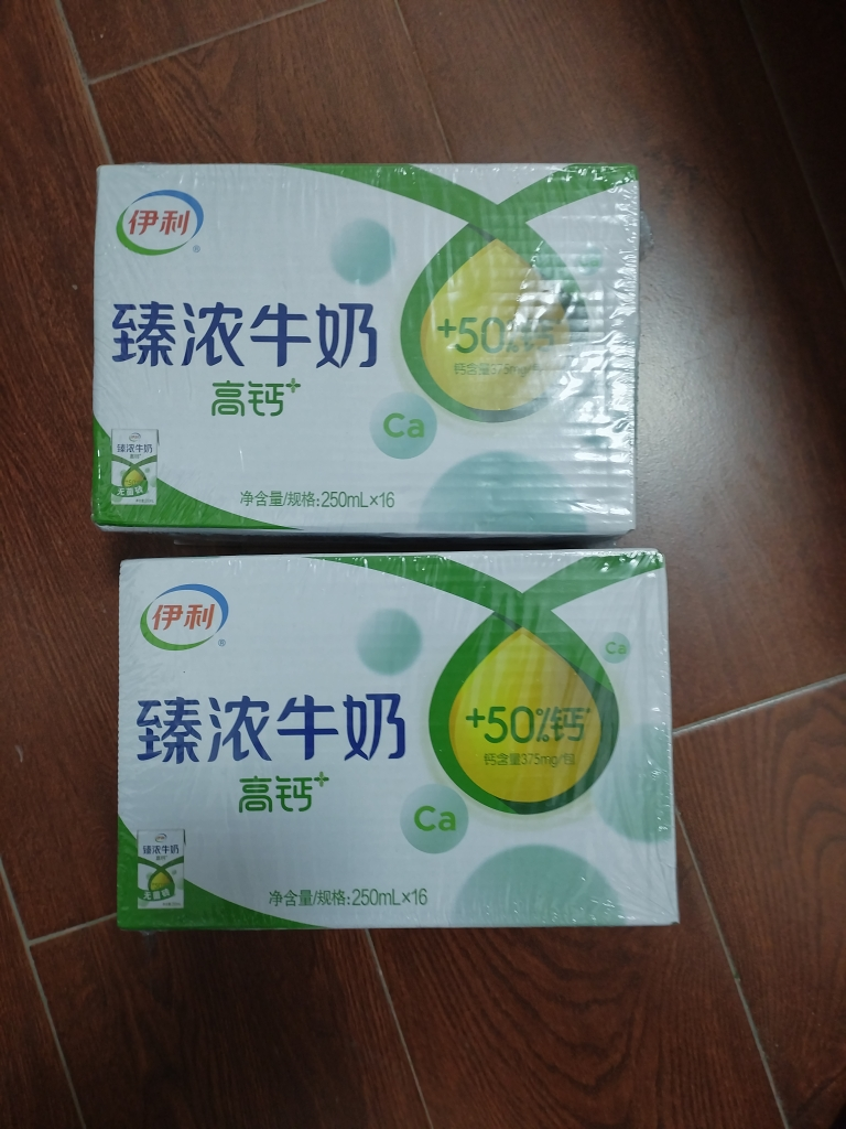 [3月生产]伊利臻浓牛奶高钙 250mL*16盒*2箱 +50%钙 咖啡伴侣 礼盒装晒单图