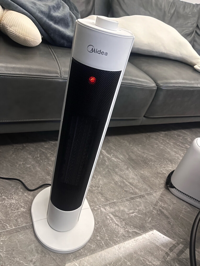 美的(Midea)取暖器/暖风机/电暖气家用/干衣机/热风机速热广角摇头节能电暖器/电暖风HFV20D晒单图