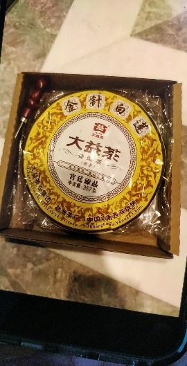 宫廷皇茶2022年大益金针白莲熟茶2201批次357g普洱七子饼晒单图