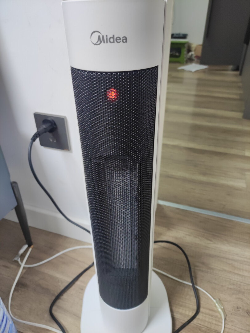 美的(Midea)取暖器/暖风机/电暖气家用/干衣机/热风机速热广角摇头节能电暖器/电暖风HFV20D晒单图