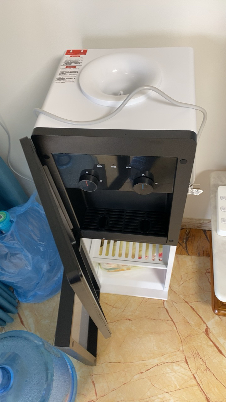 [店长推荐]美的(Midea)饮水机家用桶装水立式办公温热型饮水器烧水制热双门防尘 YR1002S-X晒单图