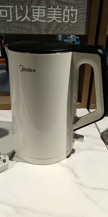 美的(Midea)电水壶MK-HJ1522电热水壶304不锈钢双层防烫速热自动断电大容量烧开水壶晒单图