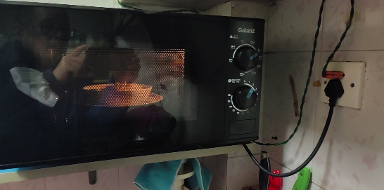 格兰仕(Galanz)微波炉 20升微蒸烤一体 旋钮控制9档火力调节 平板速热T70TGDFXB2晒单图