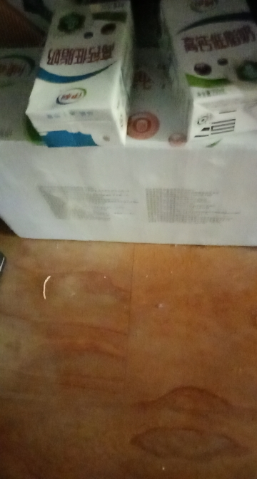 [11月生产]伊利 脱脂牛奶250ml*24盒/箱 零脂肪 好营养 整箱家庭装 礼盒装晒单图