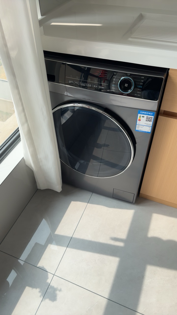 海尔(Haier)10公斤大容量 全自动滚筒洗衣机 洗干一体 洗烘一体机 智能投放 XQG100-HBD12206晒单图