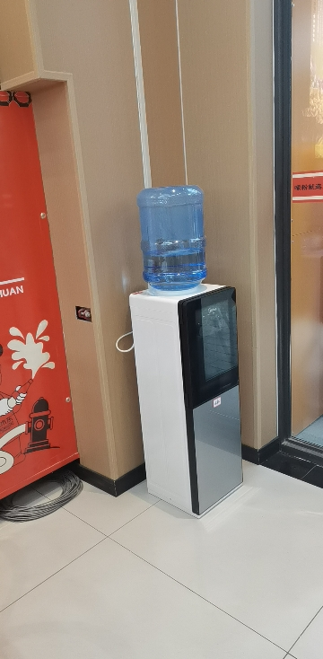 [店长推荐]美的(Midea)饮水机家用桶装水立式办公温热型饮水器烧水制热双门防尘 YR1002S-X晒单图