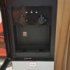 [店长推荐]美的(Midea)饮水机家用桶装水立式办公温热型饮水器烧水制热双门防尘 YR1002S-X晒单图