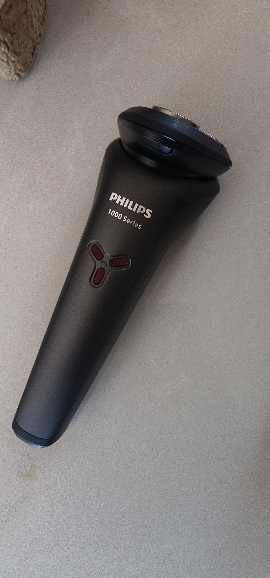 飞利浦(PHILIPS) 电动剃须刀 原装进口三刀头全身水洗胡须刀 干湿两用刮胡刀 生日礼物S1213/02晒单图