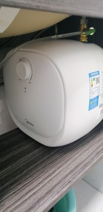 美的(Midea)暖敦敦上出水电热水器小厨宝家用6.6L迷你大水量连续出水36L搪瓷内胆一级能效速热F6.6-20CB晒单图