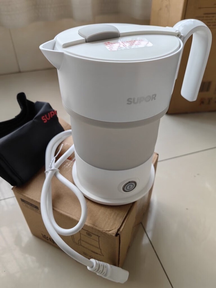 苏泊尔(SUPOR)电热水壶 便携式烧水壶 食品级硅胶折叠电水壶 出差旅行开水壶 0.6L容量 SW-06J007晒单图
