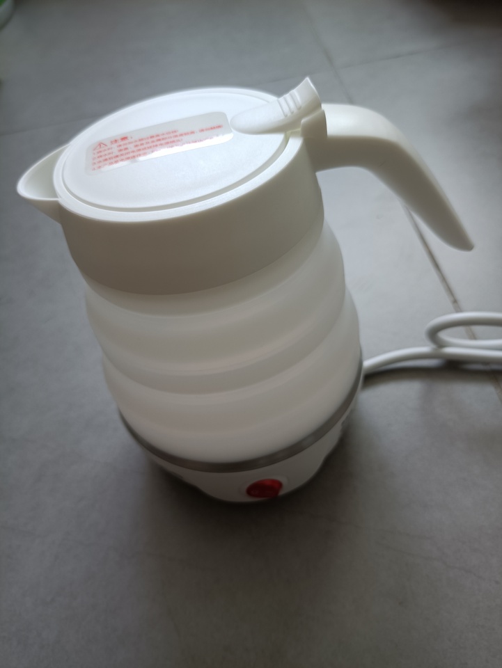 苏泊尔(SUPOR)电热水壶食品级硅胶 旅行便携电水壶 0.6L 折叠双电压烧水壶 SW-06J001晒单图