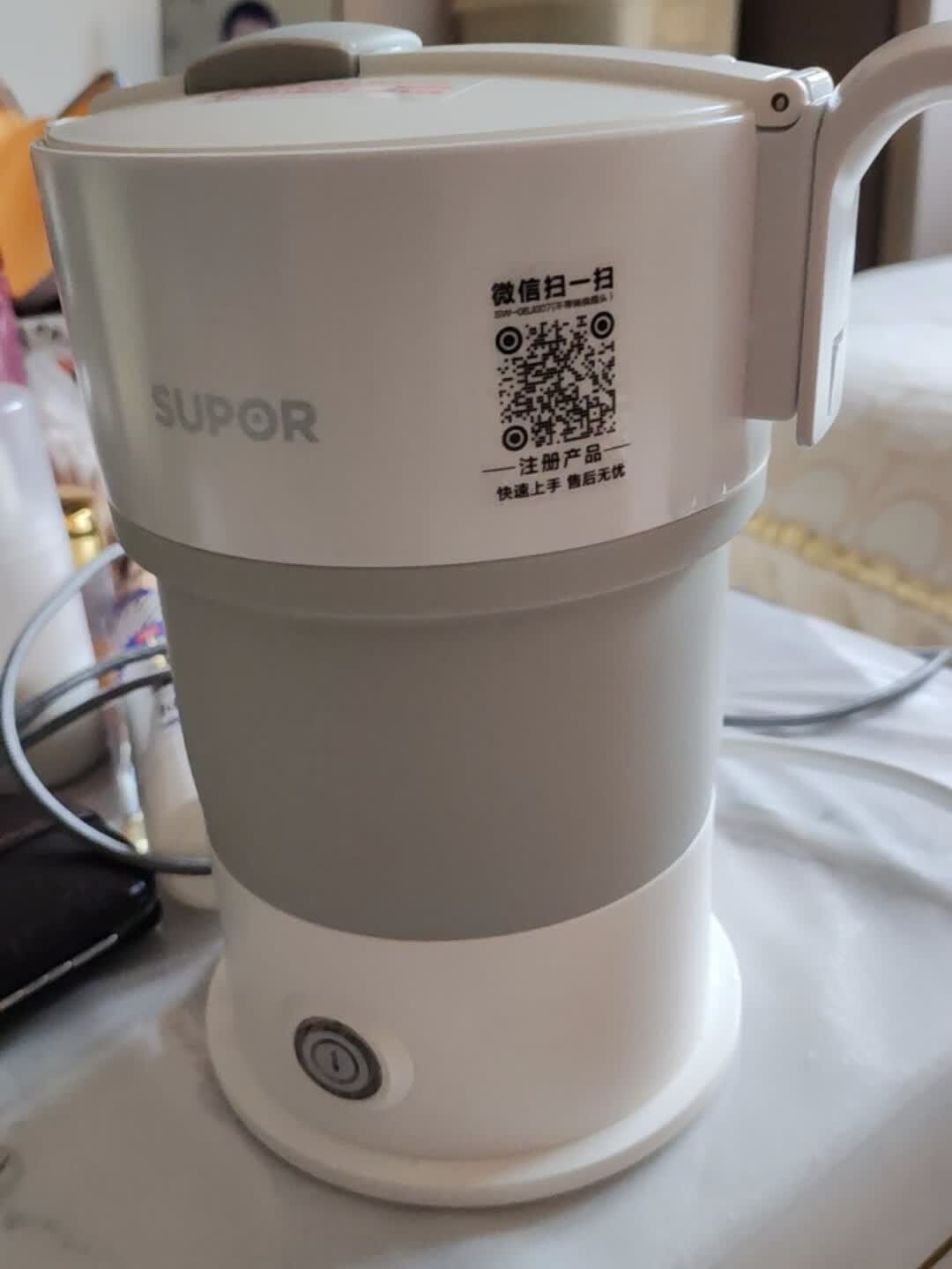 苏泊尔(SUPOR)电热水壶 便携式烧水壶 食品级硅胶折叠电水壶 出差旅行开水壶 0.6L容量 SW-06J007晒单图