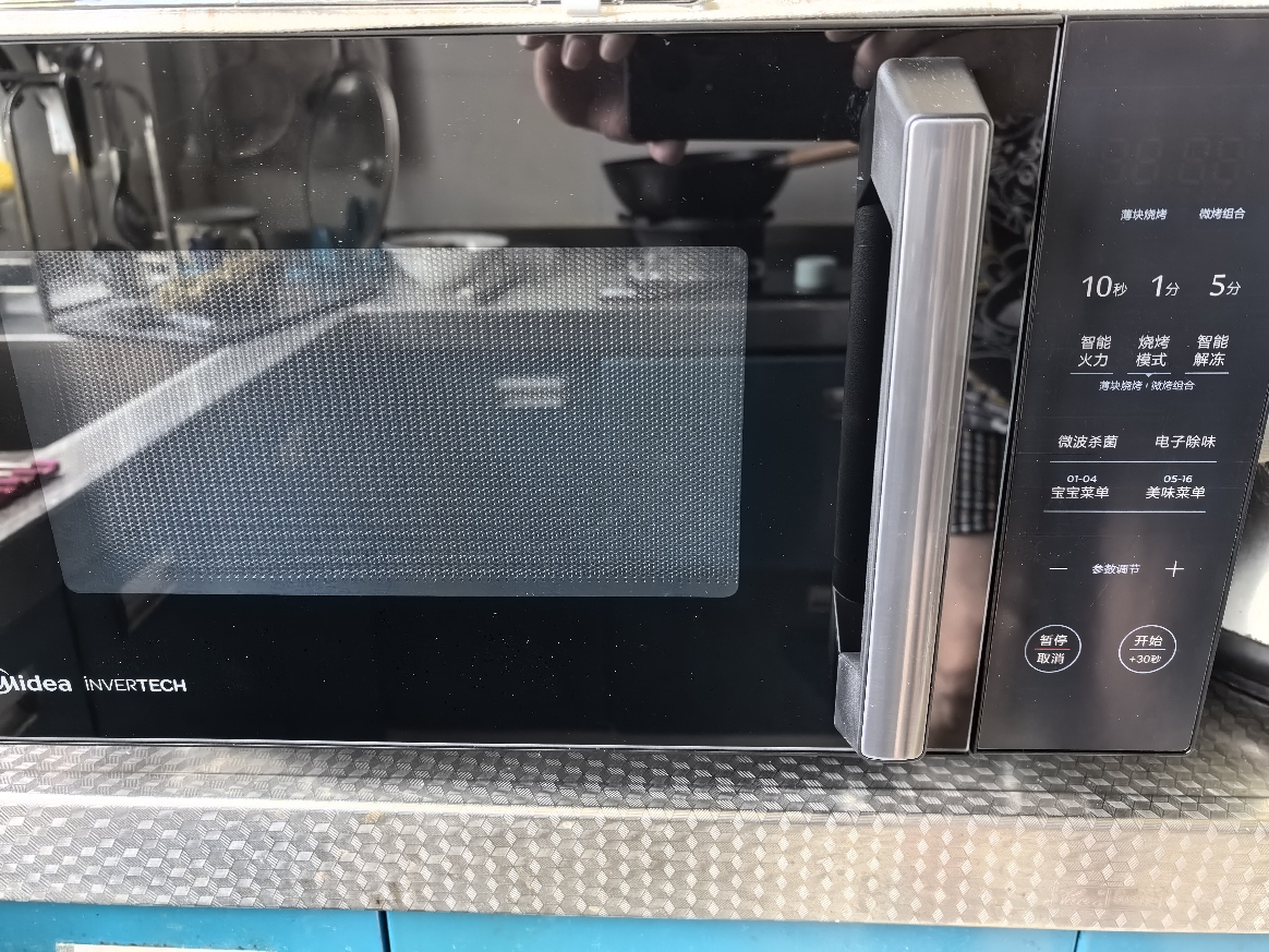 美的(Midea)智能变频 微波炉 烤箱一体机 900瓦平板加热 智能杀菌 家用微波炉 25L PC2323W晒单图