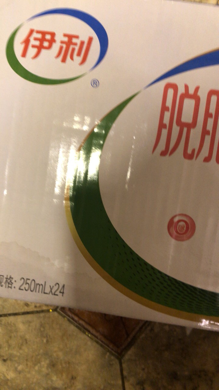 [7月生产]伊利 脱脂牛奶250ml*24盒/箱 零脂肪 好营养 整箱家庭装 礼盒装晒单图