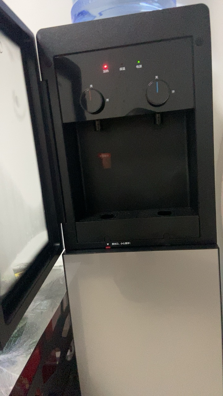 [店长推荐]美的(Midea)饮水机家用桶装水立式办公温热型饮水器烧水制热双门防尘 YR1002S-X晒单图