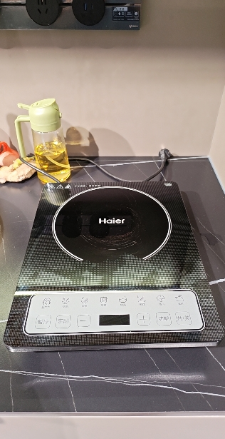 海尔智能电磁炉K22201S家用省电大火力爆炒2200瓦微面板防水 HIC-K22201S晒单图