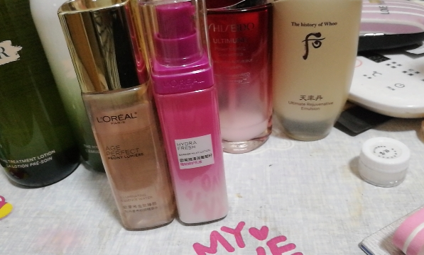 欧莱雅(LOREAL)金致臻颜牡丹奢养粉妍精萃水65ml提亮滋润紧致女士爽肤水化妆水保湿水晒单图