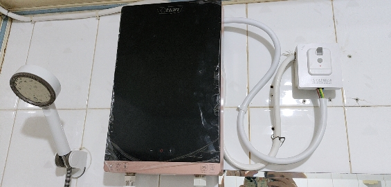 奥特朗(Otlan) 即热式电热水器 智能变频恒温微电脑触控式家用小型过水热免储水卫生间洗澡快热式 F15H-Z85A晒单图