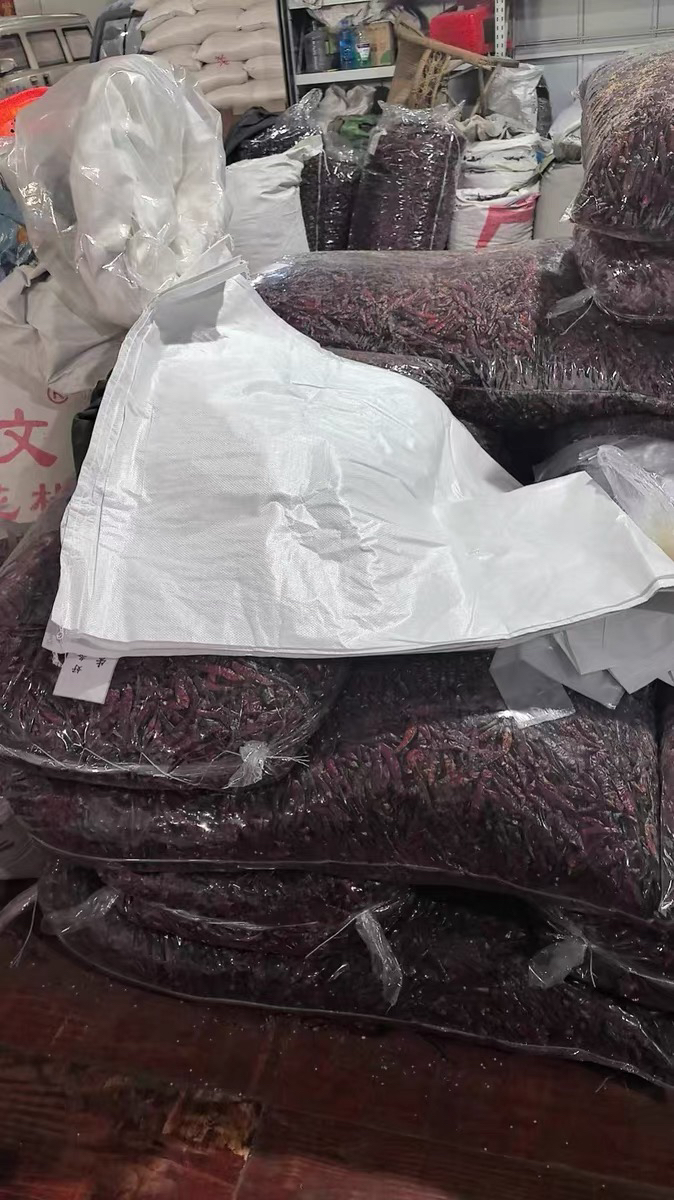 金龙航白色覆膜编织袋60*105cm-70g条晒单图