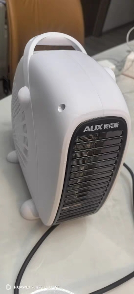 AUX奥克斯取暖器NFJ-200A2 家用暖风机办公室冷暖两用电暖气迷你电暖器 白色晒单图
