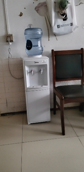 美的(Midea)饮水机家用桶装水立式办公室温热型多重防干烧大储物柜饮水器MYR718S-X晒单图