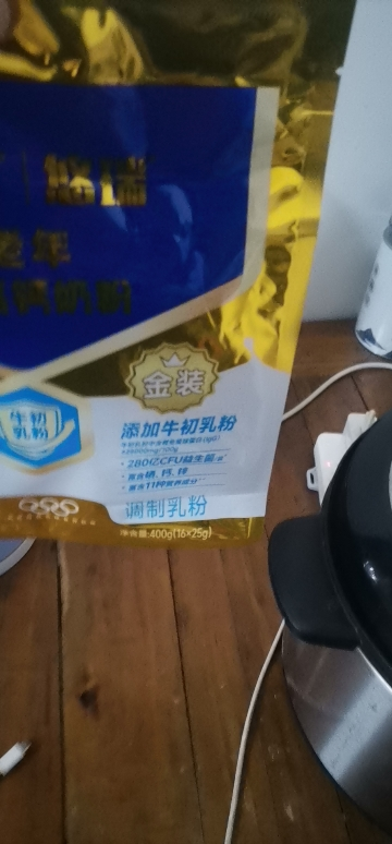 蒙牛金装中老年多维高钙奶粉400g成人老年人配方营养牛奶粉袋装晒单图