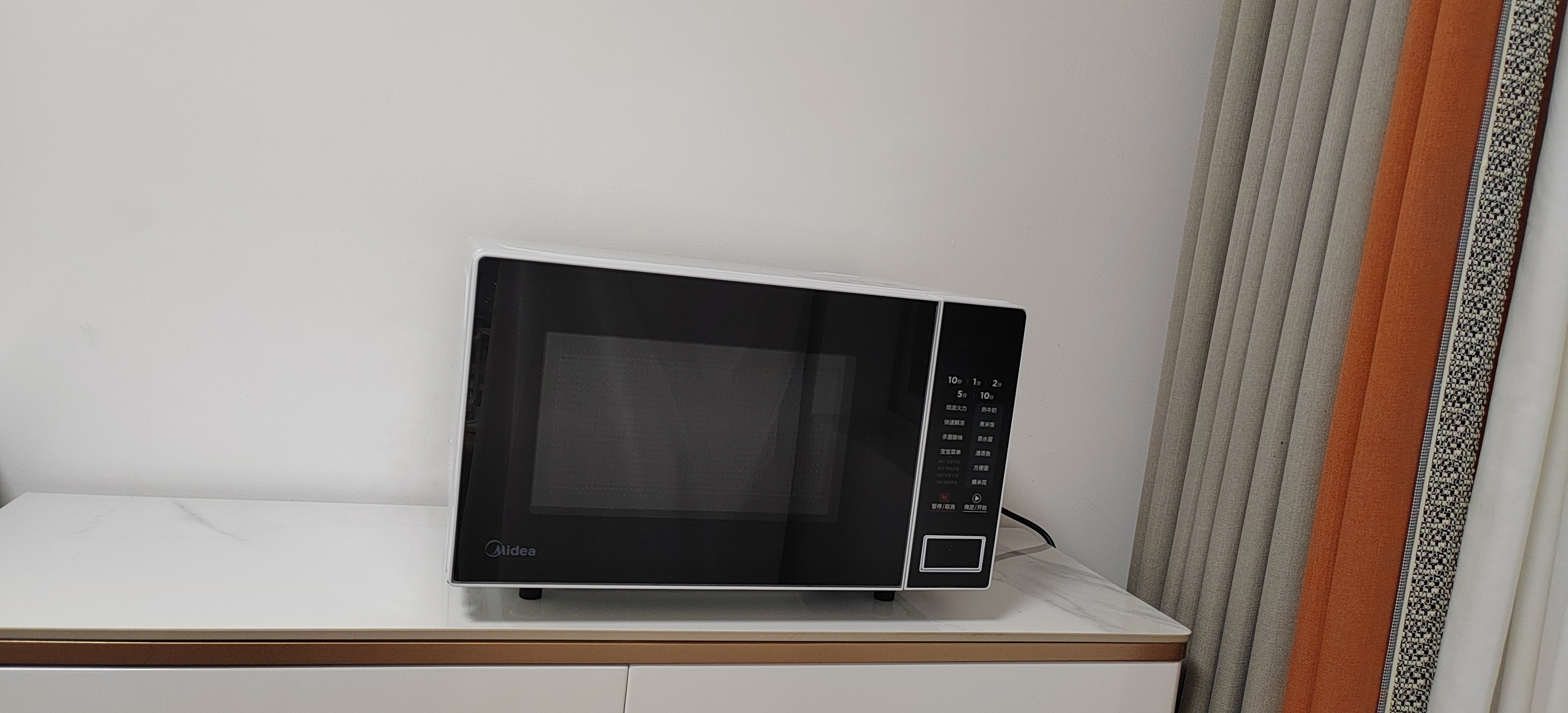 美的(Midea)微波炉20L大容量平板易清洁内胆智能菜单高效速热一键解冻杀菌除味宝宝菜单黑色M22J晒单图