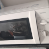 美的(Midea)快捷微波炉家用小型360°转盘加热旋钮操控易洁内胆(M1-L213B)经典款晒单图