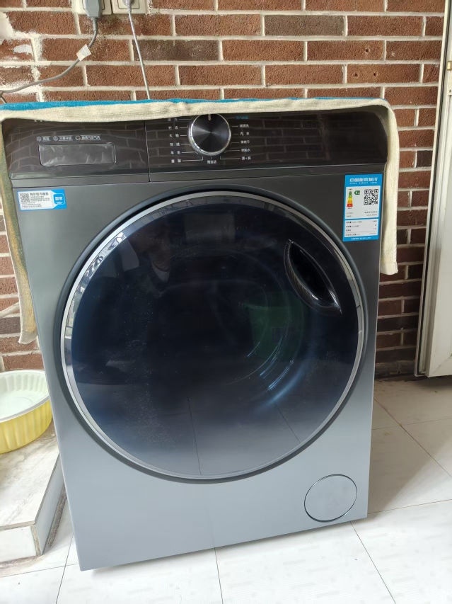 海尔(Haier)10公斤 小红花 直驱变频 智能投放 防过敏 滚筒洗衣机 洗烘一体机XQG100-HBD526H晒单图
