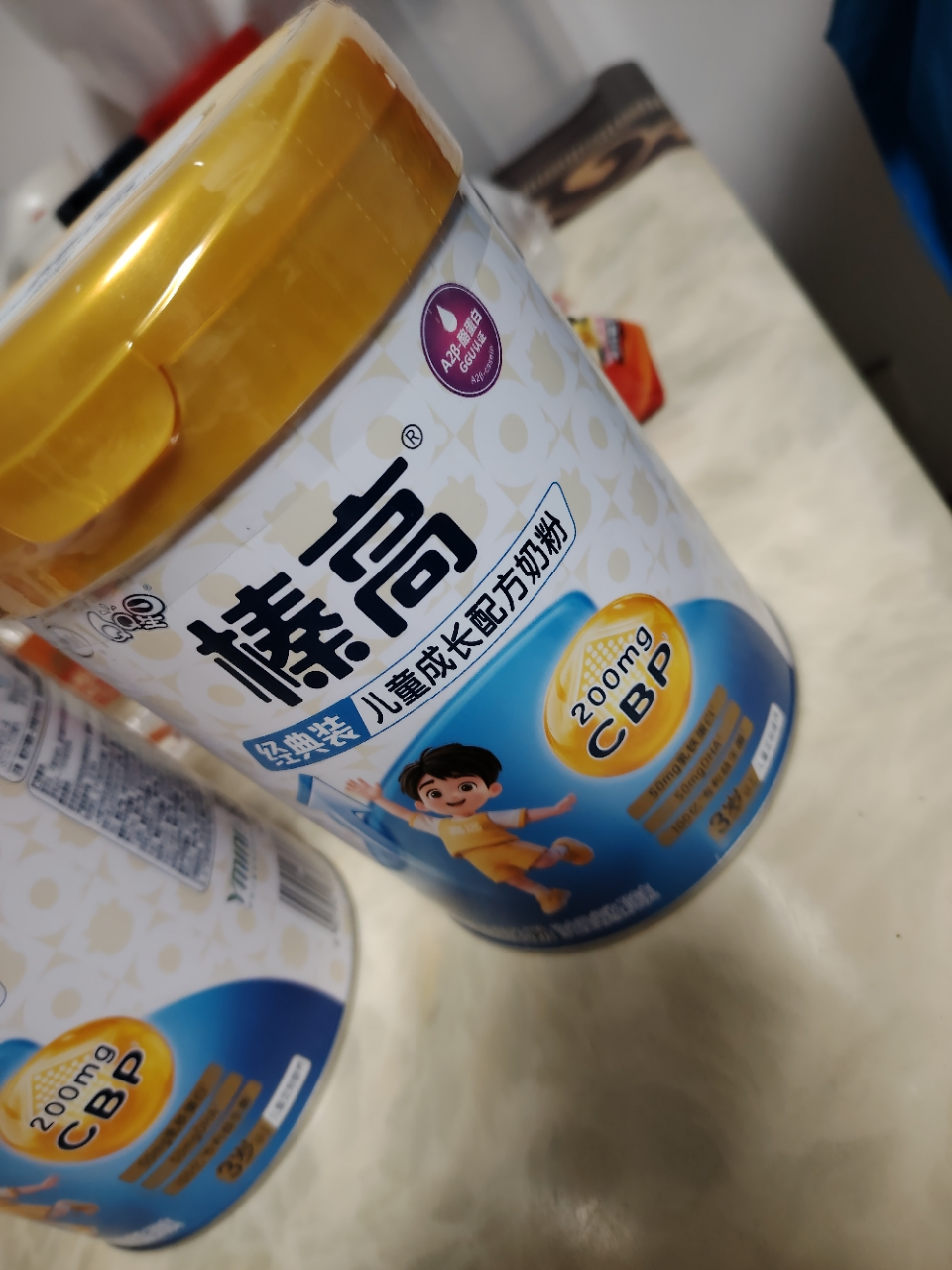 伊利(YILI)qq星榛高3岁以上儿童配方奶粉4段700g罐(新旧包装随机)晒单图