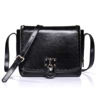 NUCELLE纽芝兰公主日记系列牛皮花边冲孔斜挎包 561典雅黑