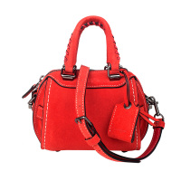 COACH 女士LOGO挂饰牛皮手提斜挎包 38201