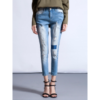 女装冬季不规则破洞水洗牛仔长裤