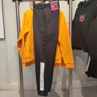 安踏运动裤女2021春新款撞色拼接时尚潮流束脚针织长裤162118319