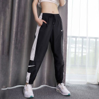 NIKE耐克裤子女春夏新款运动裤潮流休闲裤薄款束脚宽松直筒 梭织快干DC0041-010