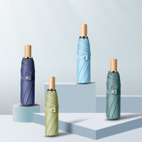 旭晴三折手开黑胶防晒清新小木柄晴雨伞