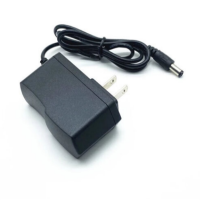 公 纽电源适配器12V 2A
