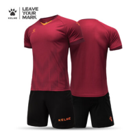 卡尔美足球服套装 枣红荧光橙3801096