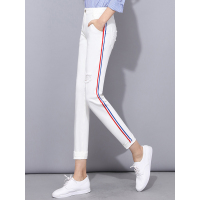 春款弹力牛仔破洞九分哈伦裤侧缝撞色织带装饰小脚牛仔裤百搭弹力显瘦微垮牛仔裤