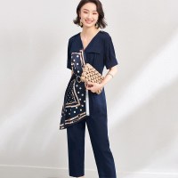 欧昵雪夏季设计感收腰仿真丝印花连体裤女显瘦九分连衣裤