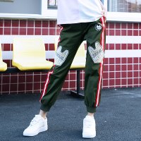 a02新款个性图案侧边条纹抽绳束脚休闲运动裤女DTT1B0101PN