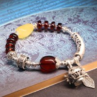 一生一石夕阳如血天然水晶手链原创时尚血珀蜜蜡925纯银手链女 核心描述