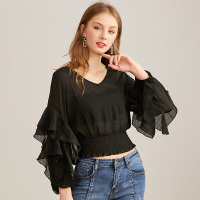 依尚街区荷叶袖套头衬衫女2020春时尚韩版纯色宽松显瘦上衣