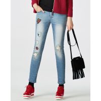 Moonbasa/梦芭莎 欧美休闲女装时尚图章洗水磨破合身修腿窄脚牛仔长裤