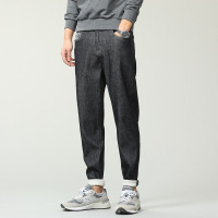 港风潮牌黑色锥形牛仔裤男原色风洗水刺绣小脚裤秋季深色网红哈伦