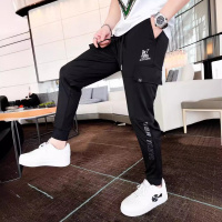 夏季新款薄款休闲裤男士修身小脚九分裤时尚潮流假口袋工装裤裤子