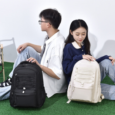 新款大容量新款简约潮流男女双肩背包中大学生书包休闲百搭双肩包
