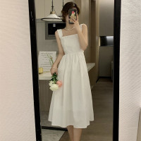 海边度假吊带裙子女春夏季年新款茶歇法式白色连衣裙气质长裙